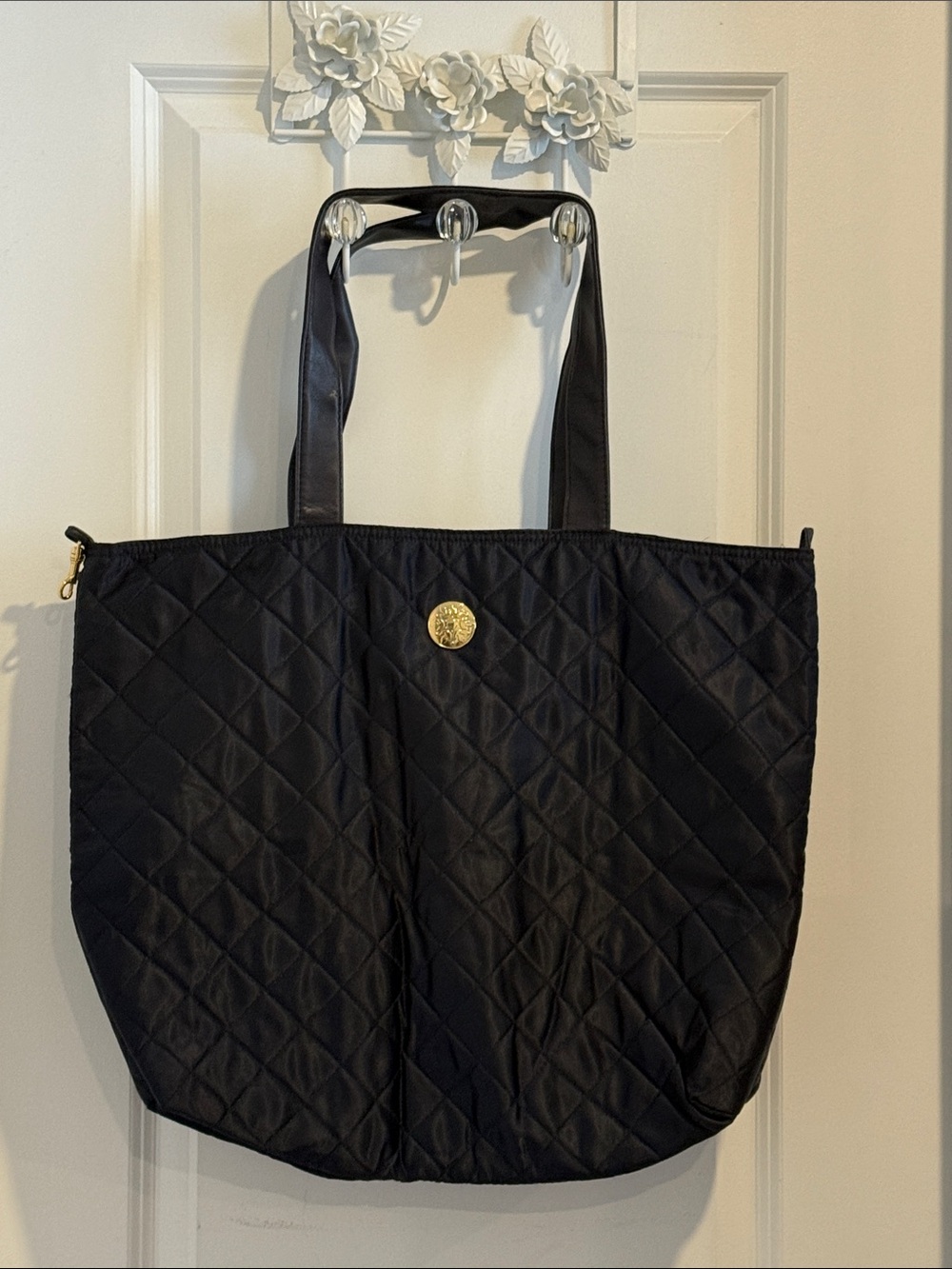Avon Navy Quilted Tote with Gold Medallion